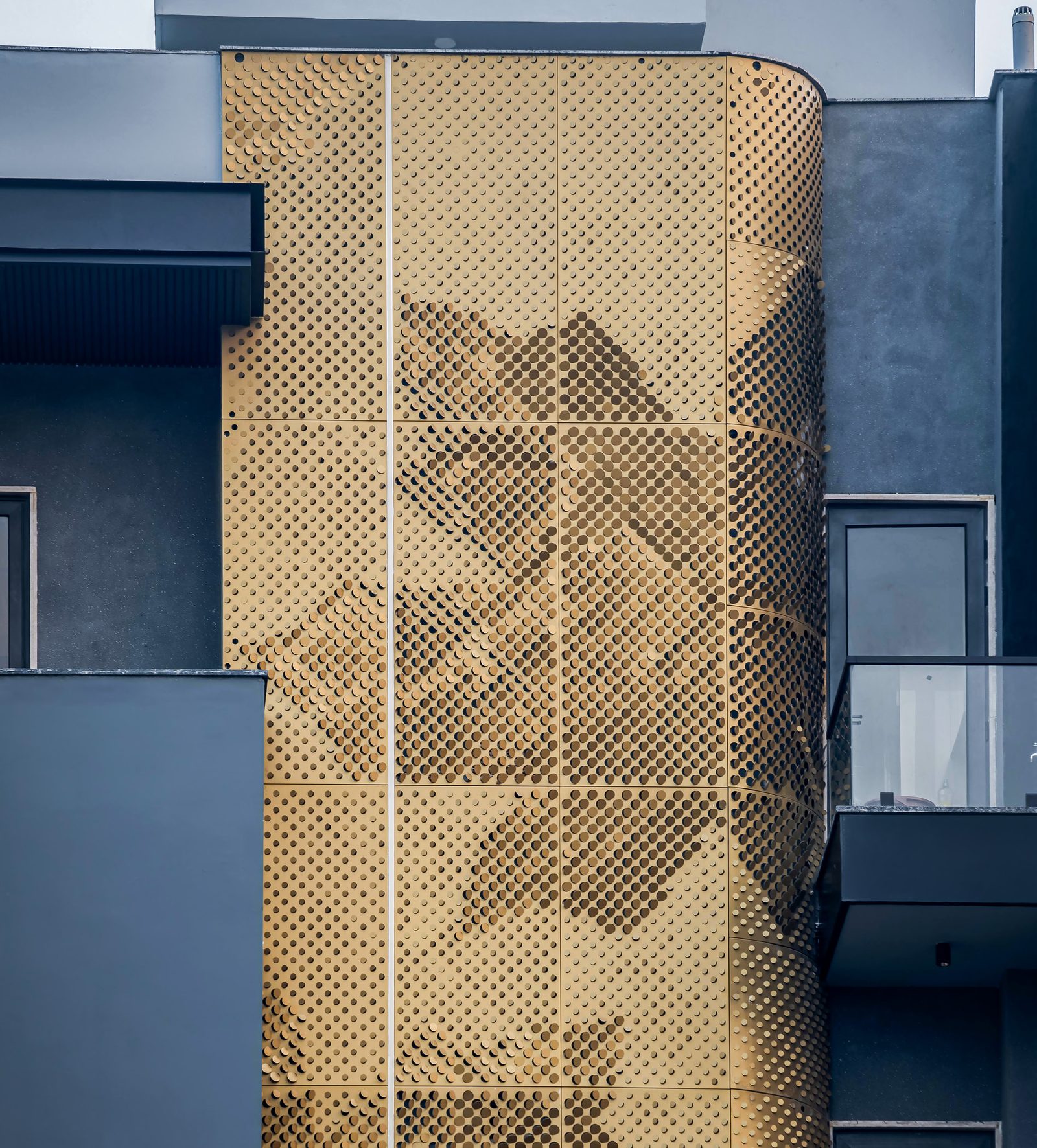 Coin Matrix metal facade by Metalia